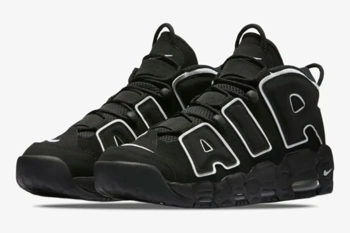 Three-quarter view of Nike Air More Uptempo Black White OG sneakers with iconic large white 'AIR' branding. - SKU 414962-002