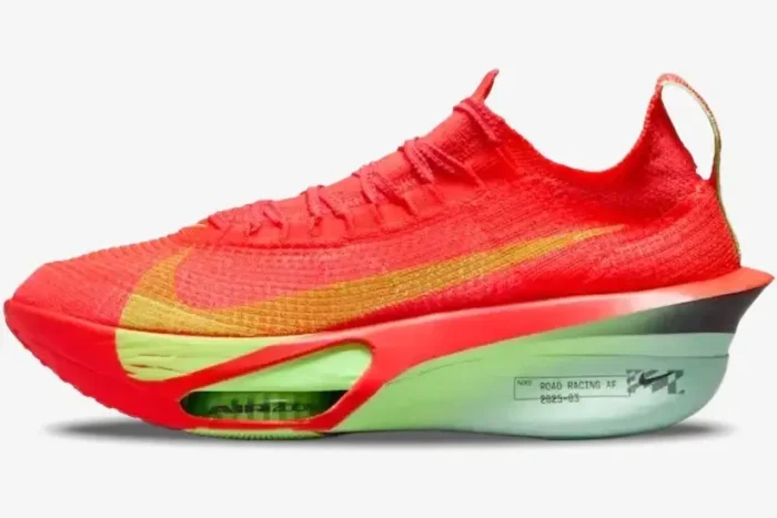 Side profile of Nike Air Zoom Alphafly Next% 3 running shoe in bright orange, red, and lime green. - SKU FD8311-600