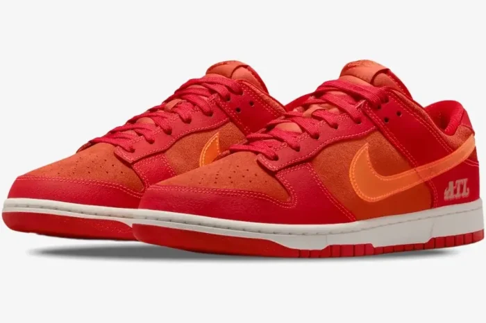 Nike Dunk Low ATL Special Edition sneakers in red and orange, three-quarter side view. - SKU FD0724-657