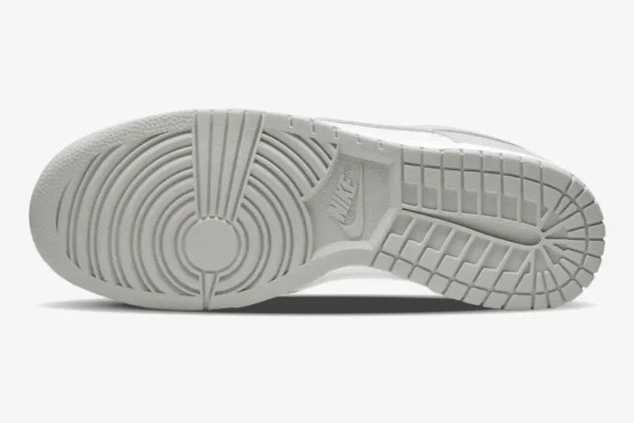 Bottom view of the light grey rubber outsole on a Nike Dunk Low Grey Fog sneaker. - SKU DD1391-103