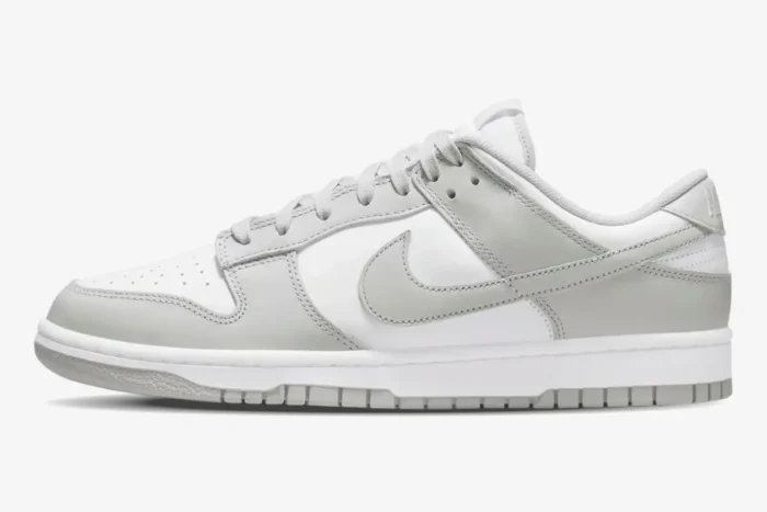 Nike Dunk Low Grey Fog sneakers in a side profile view featuring white and light grey leather. - SKU DD1391-103