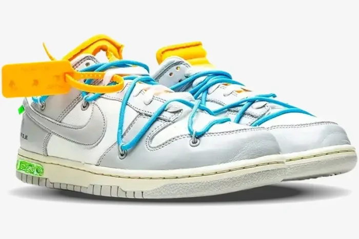 Nike Dunk Low x Off-White Lot 2 of 50 in grey and white with blue laces, three-quarter front view. - SKU DM1602115