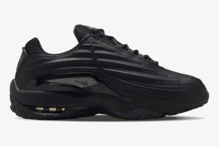 Side profile view of the Nike Hot Step 2 x NOCTA sneaker in a sleek all-black colorway. - SKU DZ7293-001