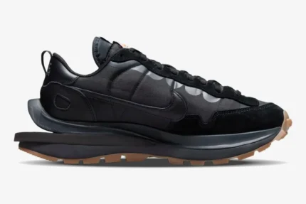 Nike VaporWaffle x Sacai Black and Gum sneakers shown from a side profile view against a white background. - SKU DD1875-001