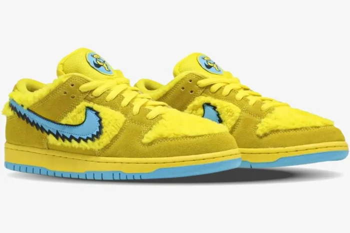 Nike SB Dunk Low Grateful Dead Bears Opti Yellow sneakers with faux fur and blue swoosh, side view. - SKU CJ5378-700