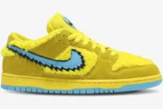 Nike SB Dunk Low Grateful Dead Bears Opti Yellow fuzzy sneaker with blue jagged swoosh, side profile view. - SKU CJ5378-700