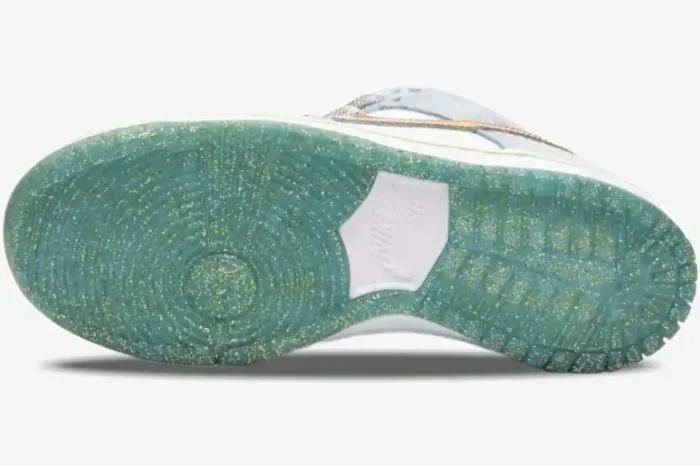 Bottom view of Nike SB Dunk Low Sean Cliver showing translucent teal glitter outsole and white logo. - SKU DC9936-100