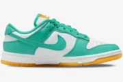 Nike Wmns Dunk Low 'Teal Zeal' sneaker in white and teal with a gum sole, side profile view. - SKU DV2190-100