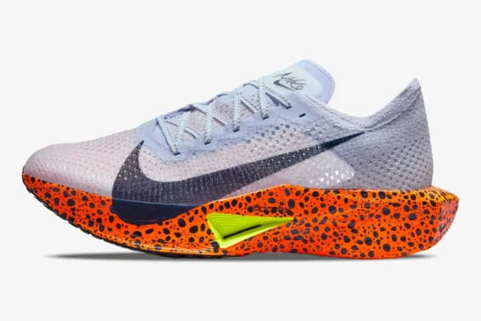 Nike ZoomX Vaporfly 3 running shoe in light purple and orange safari print, side profile view. - SKU FV2324-100