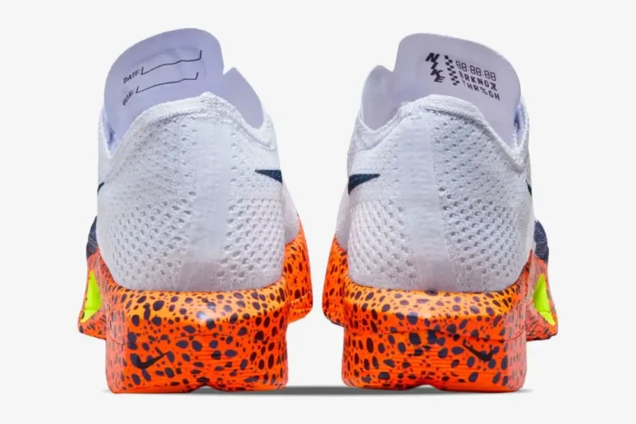 Rear view of Nike ZoomX Vaporfly 3 Olympic Safari shoes featuring white mesh uppers and orange safari print midsoles. - SKU FV2324-100