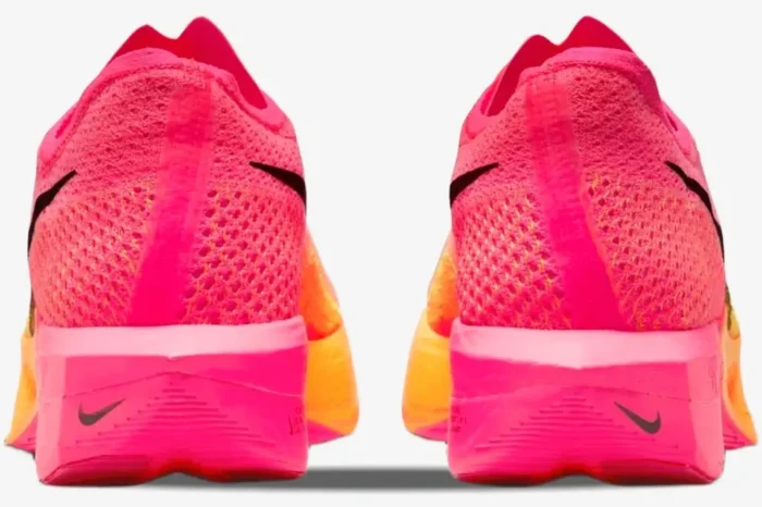 Rear view of Nike ZoomX Vaporfly 3 performance running shoes in vibrant pink and orange colors. - SKU DV4129-600