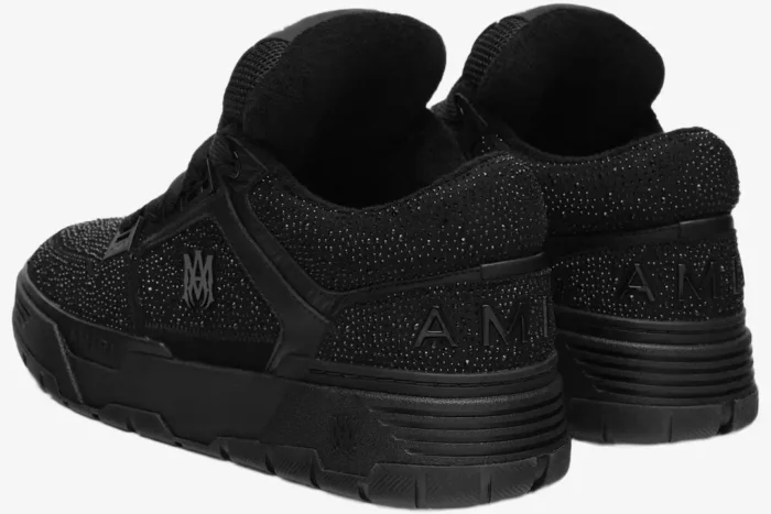 Black Amiri MA-1 crystal-embellished sneakers shown from a rear three-quarter perspective. - SKU AMFOSR1038-001