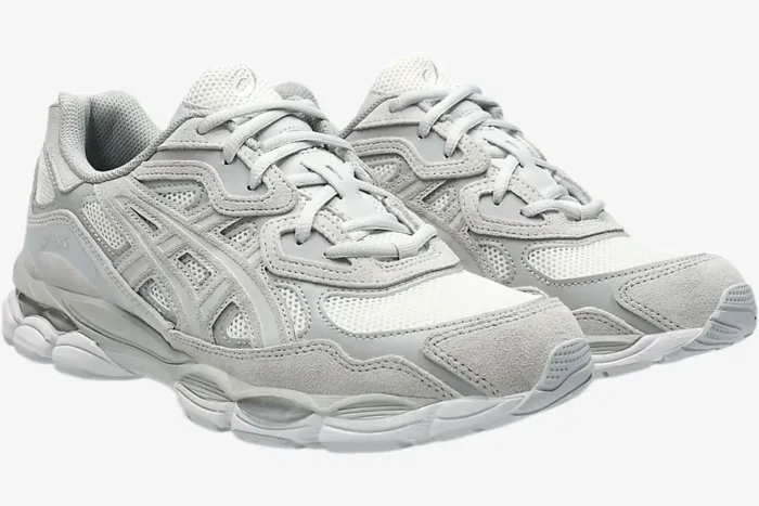 Asics Gel NYC sneakers in Cream Cloud Grey, three-quarter front view showing mesh and suede overlays. - SKU 1203A663-101