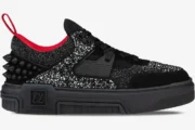 Side profile of Christian Louboutin Astroloubi sneakers in black and silver with red accents and heel spikes. - SKU 3230886H358