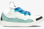 Side profile of a Lanvin Curb Sneaker in white and green with chunky blue braided laces. - SKU FM-SKRK11-DRAG-H220040