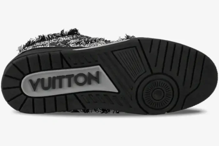 Bottom view of the black Louis Vuitton Skate x Swarovski Monogram shoe outsole with 'VUITTON' branding. - SKU 1ABMHV