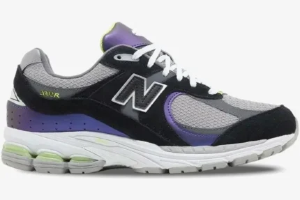New Balance 2002R x DTLR Purple Noir sneaker side profile with black suede and iridescent purple panels. - SKU M2002RHI