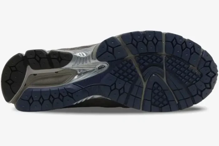 Bottom view of the New Balance 2002R GORE-TEX Castlerock Natural Indigo outsole with blue and grey tread. - SKU M2002RXC