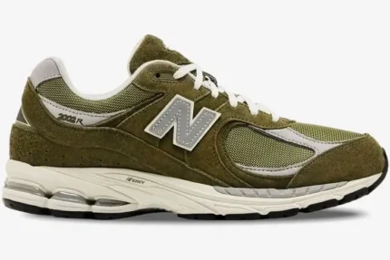 Side profile of New Balance 2002R Footlocker Exclusive sneakers in olive green suede and mesh. - SKU M2002RFO