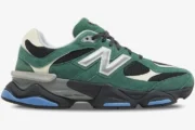 Side profile of New Balance 9060 sneakers in forest green and black with a chunky midsole. - SKU U9060VRA