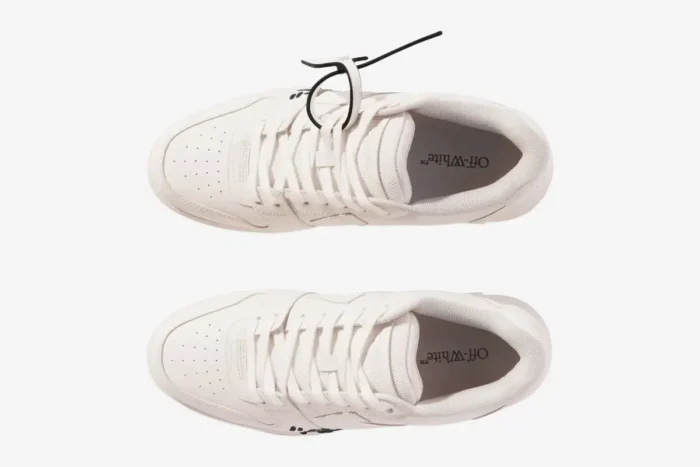Top-down view of white Off-White Out Of Office sneakers with signature zip-tie and branding on the insole. - SKU OMIA189C99LEA0010110