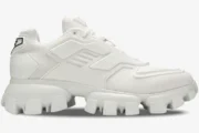Prada Cloudbust Thunder Knit white sneaker in a side profile view with chunky lugged sole. - SKU 2EG293-3KZU-F0009