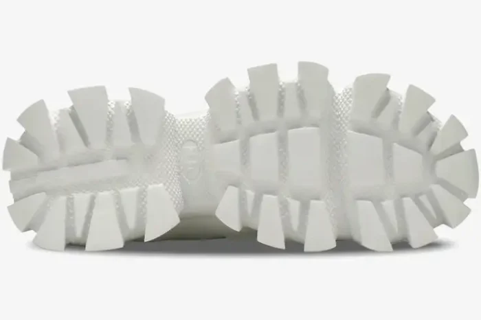 Bottom view of the chunky white lugged sole of a Prada Cloudbust Thunder Knit sneaker. - SKU 2EG293-3KZU-F0009