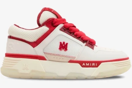 Amiri MA-1 sneaker in white and red, side profile view showing chunky sole and red logo details. - SKU PS24MFS018-610