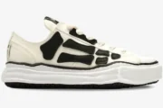 Amiri x Maison Mihara Yasuhiro Peterson OG Sole Canvas Low in white with black bone overlays, side profile view. - SKU AMFOSR1076271