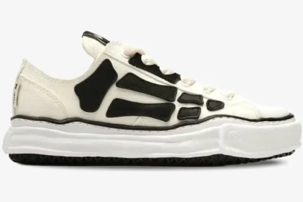 Amiri x Maison Mihara Yasuhiro Peterson OG Sole Canvas Low in white with black bone overlays, side profile view. - SKU AMFOSR1076271