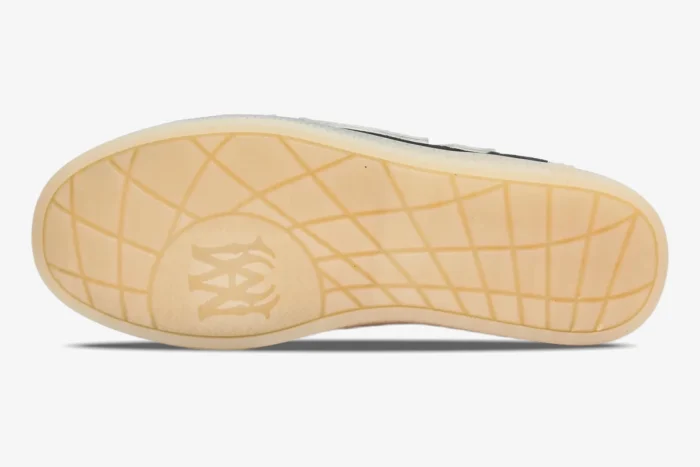 Bottom view of the Amiri Pacific Bones sneaker featuring a gum rubber outsole with a grid pattern and monogram logo. - SKU amfosr1102-001