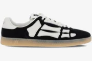 Side profile of Amiri Pacific Bones sneakers in black suede with white leather bone overlays and gum soles. - SKU amfosr1102-001