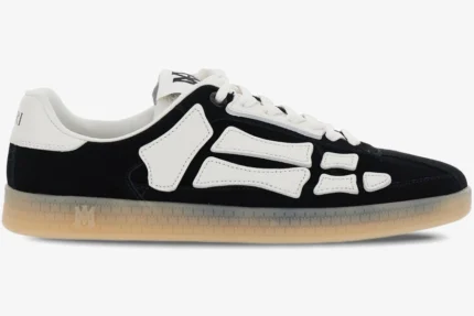 Side profile of Amiri Pacific Bones sneakers in black suede with white leather bone overlays and gum soles. - SKU amfosr1102-001