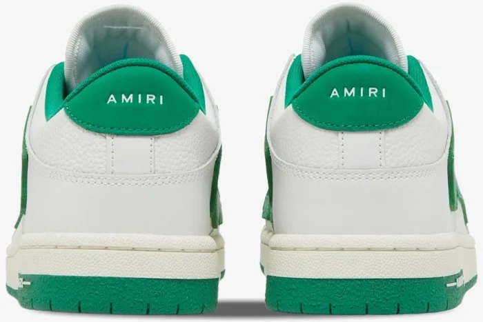 Rear view of Amiri Skel Top Low sneakers in white and green with branded heel tabs. - SKU MFS003-114