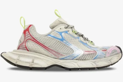 Side profile of Balenciaga 3XL Sneaker in distressed multi-color mesh with chunky sole. - SKU 734734W3XL59645