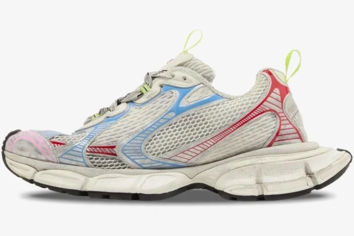 Side profile of Balenciaga 3XL Sneaker Distressed Multi-Color Edition with mesh upper and colorful overlays. - SKU 734734W3XL59645