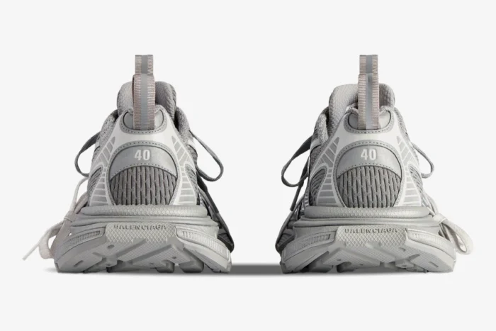 Back view of Balenciaga 3XL grey reflective mesh and polyurethane low top sneakers showing the heels. - SKU 734734W3XLR1281