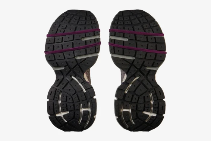 Bottom view of Balenciaga 3XL sneakers in purple and grey showing black textured outsoles. - SKU 241342F128023