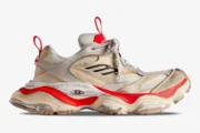 Side view of a Balenciaga Cargo Worn-Out sneaker in beige and red with a distressed finish. - SKU 785754W2MV12160