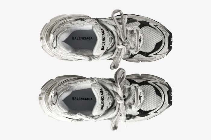 Top-down view of Balenciaga Runner Gradient Sneakers in white and black with distressed mesh details. - SKU 677403W3RB19010