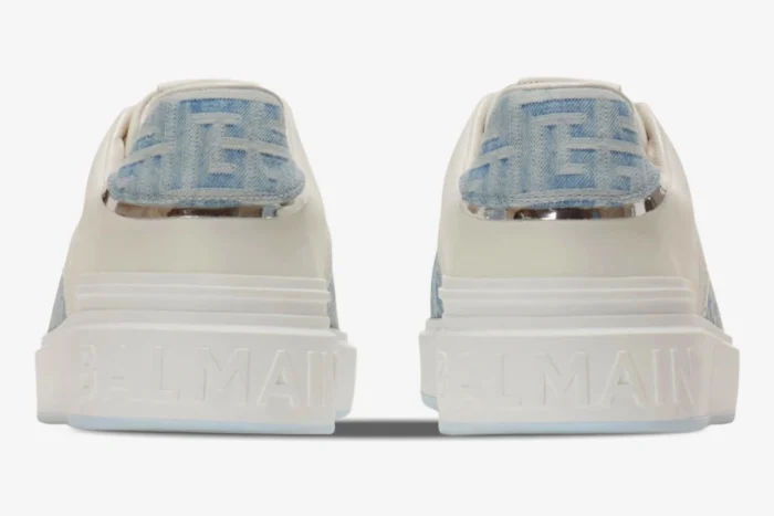 Back view of Balmain B-Court low-top sneakers in white with blue monogrammed denim heel tabs. - SKU XM1VI291LDSH