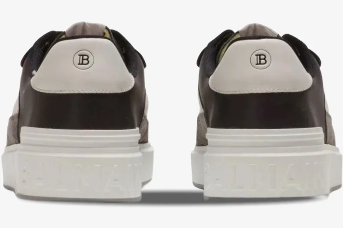 Rear view of Balmain B-Court Flip Low-Top sneakers in black, white, and grey with embossed logo on the sole. - SKU AM1VI245LSEP