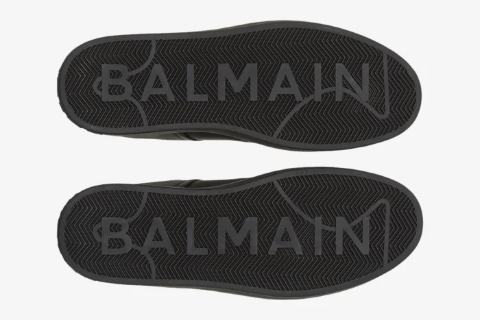 Bottom view of black Balmain B-Court Trainer soles with embossed brand logo. - SKU GM1VI288LVTR