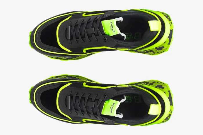 Top-down view of black Balmain B-Racer sneakers with neon yellow accents and a marbled midsole. - SKU ym1vi305tvnh