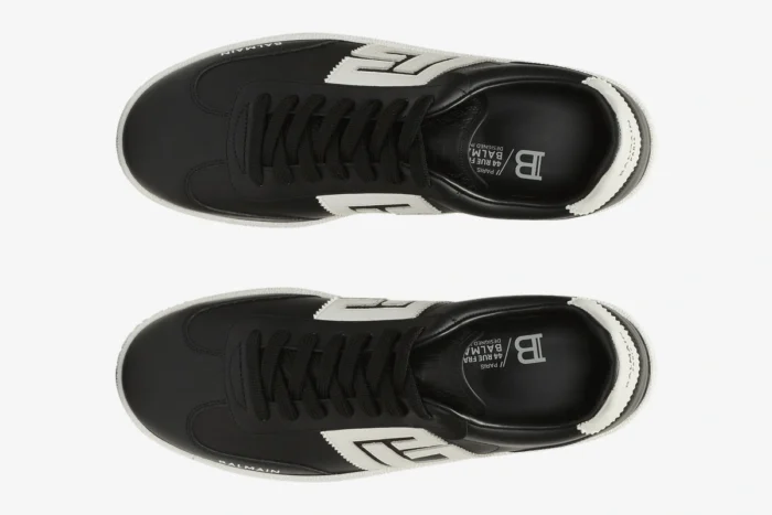 Top-down view of black and white Balmain Calfskin Swan Trainers with leather uppers and white logos. - SKU EM0VI360LVTR
