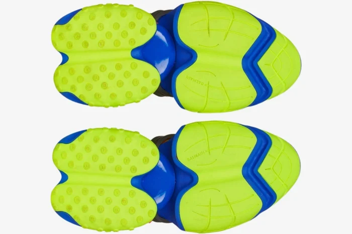 Bottom view of Balmain Unicorn Low Multicolor Black sneakers featuring neon green and blue segmented outsoles. - SKU YM1VJ309KNHC
