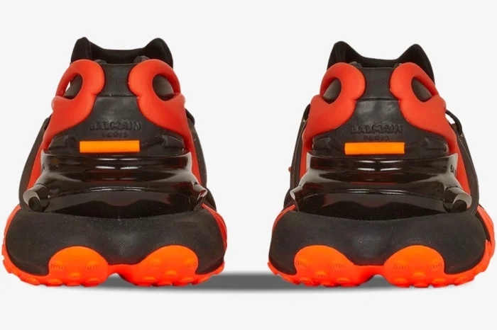 Rear view of Balmain Unicorn Low-Top sneakers in black and vibrant orange. - SKU YM1VJ309KNCA