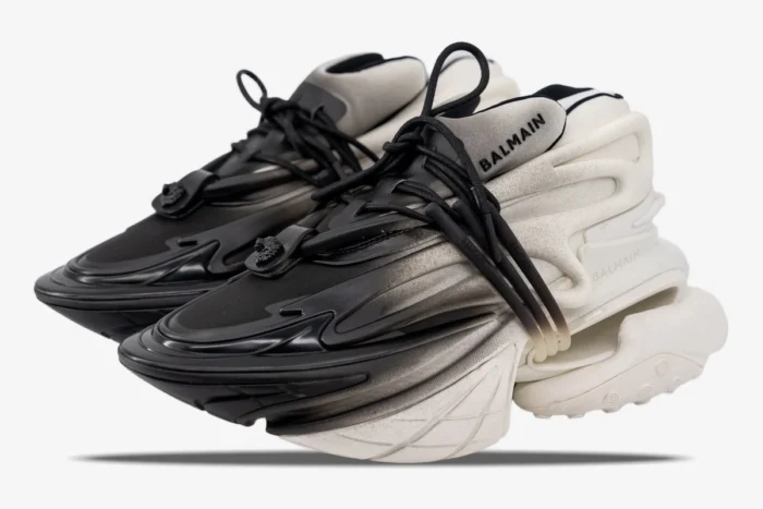 Balmain Unicorn Low Top sneakers in white and black gradient, three-quarter side view. - SKU YM0VJ309KNED-GAB