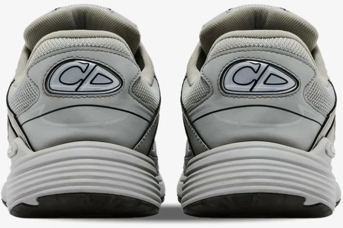 Rear view of grey Christian Dior B30 sneakers featuring the CD logo and ribbed soles. - SKU 3SN279ZRD_H868