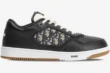 Dior B27 low-top sneaker in black leather with beige oblique motif, shown from a side profile view. - SKU 3SN272ZIR_H965